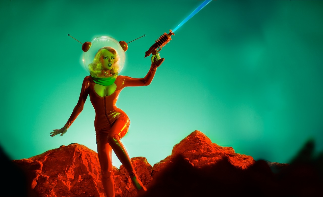 The model Mosh, in a red space suit