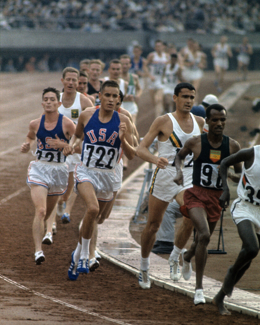 Billy Mills in the middle of the pack during his 1964 Olympic race