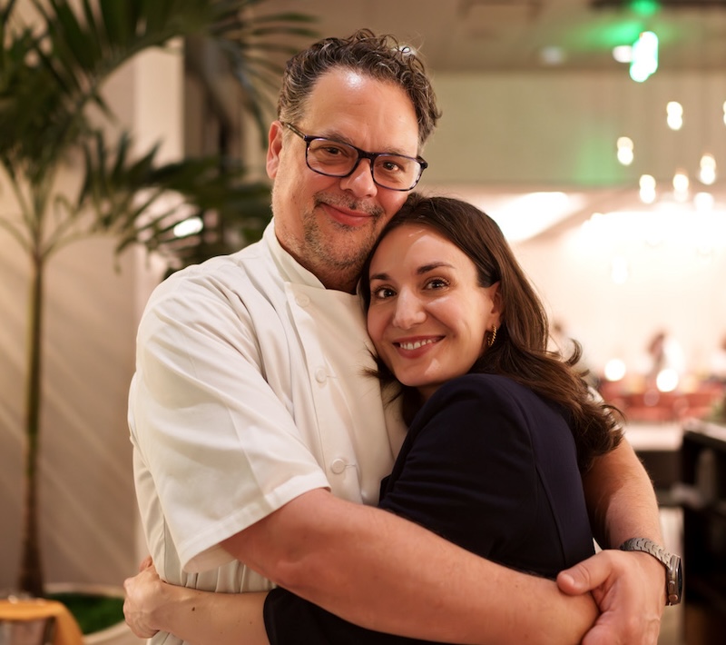 Owners Deneb Williams and Elizabeth-Rose Mandalou hugging each other